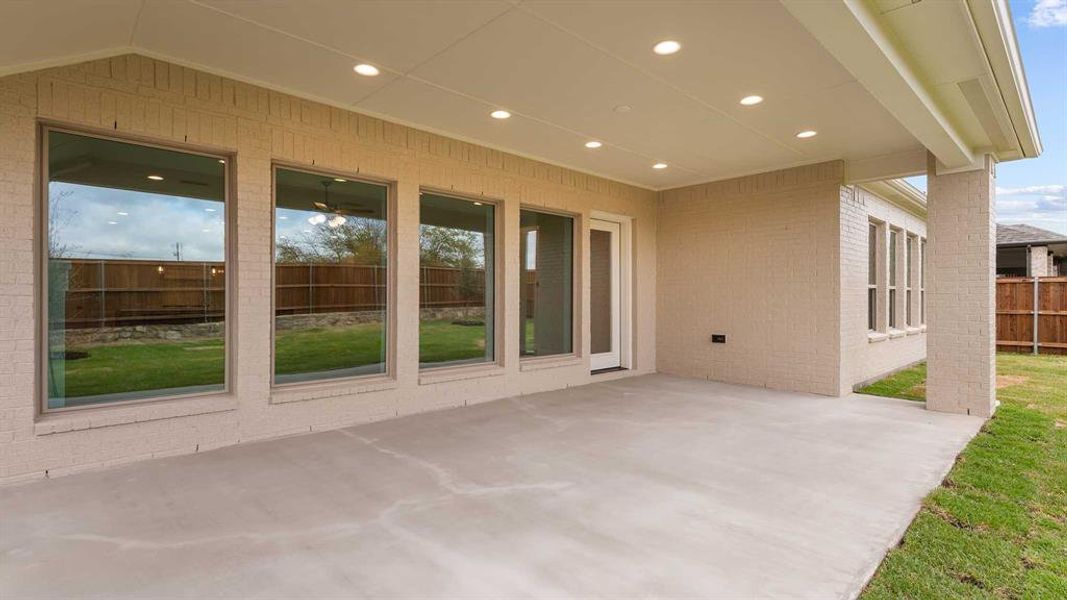 Exterior details and patio area of a home in Walsh Ranch 55', Fort Worth (Image 3).