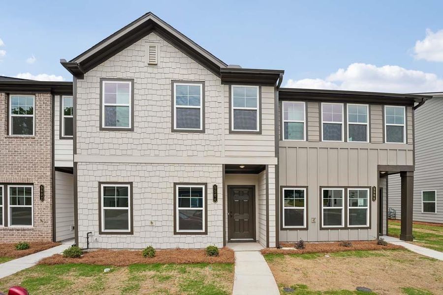 Front exterior of a new home in Laurelwood, Douglasville, GA, highlighting curb appeal (Image 19).