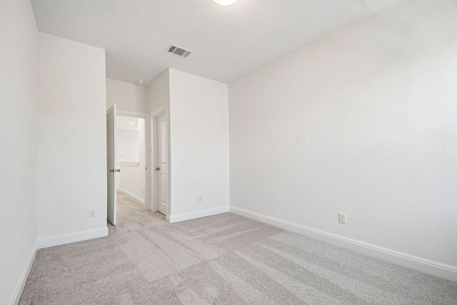 Spacious, unfurnished interior of a new home in 6 Creeks, Kyle (Image 24).