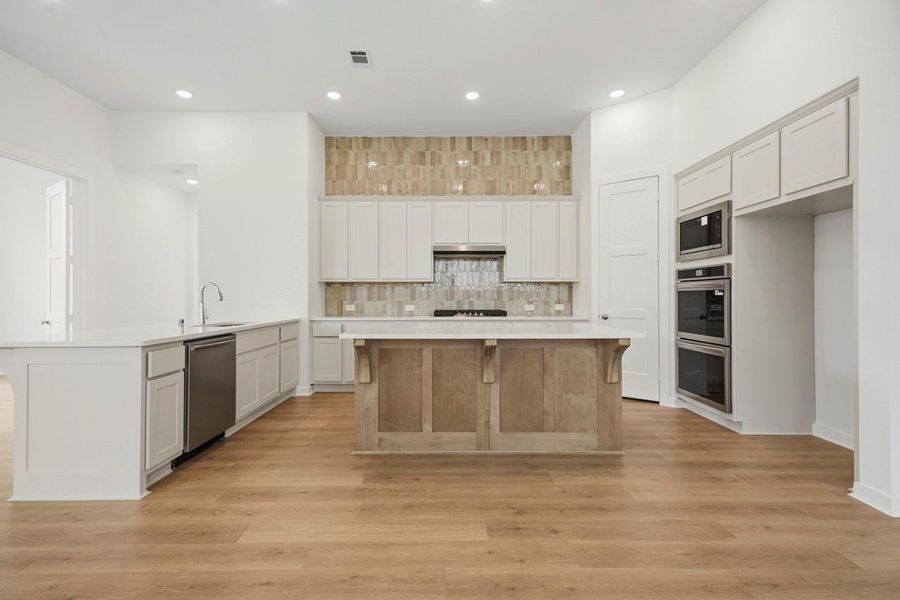 Kitchen backsplash all the way to the ceiling gives it a unique look. Kitchen backsplash all the way to the ceiling gives it a unique look.