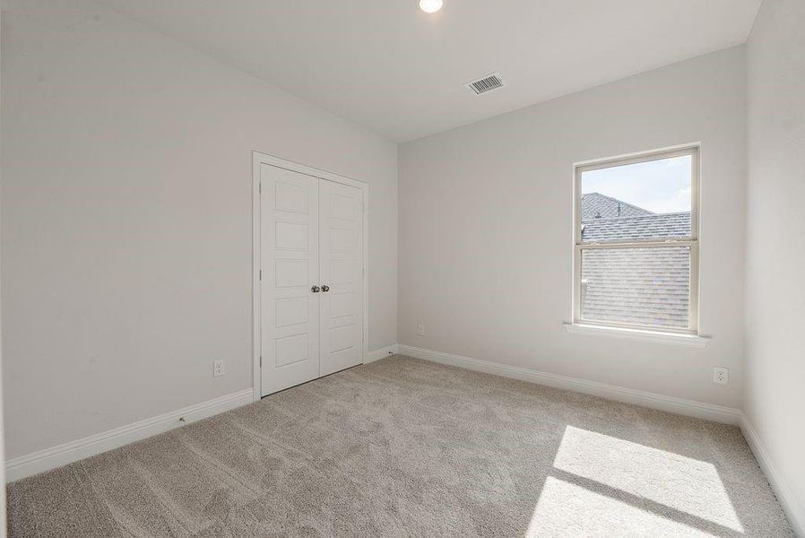 Spacious, unfurnished interior of a new home in Spiritas Ranch, Little Elm (Image 27). Spacious, unfurnished interior of a new home in Spiritas Ranch, Little Elm (Image 27).
