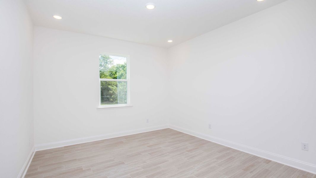 Representative unfurnished interior of a home built from the Naples by Maronda Homes in Golden Gate, Naples (Image 16).
