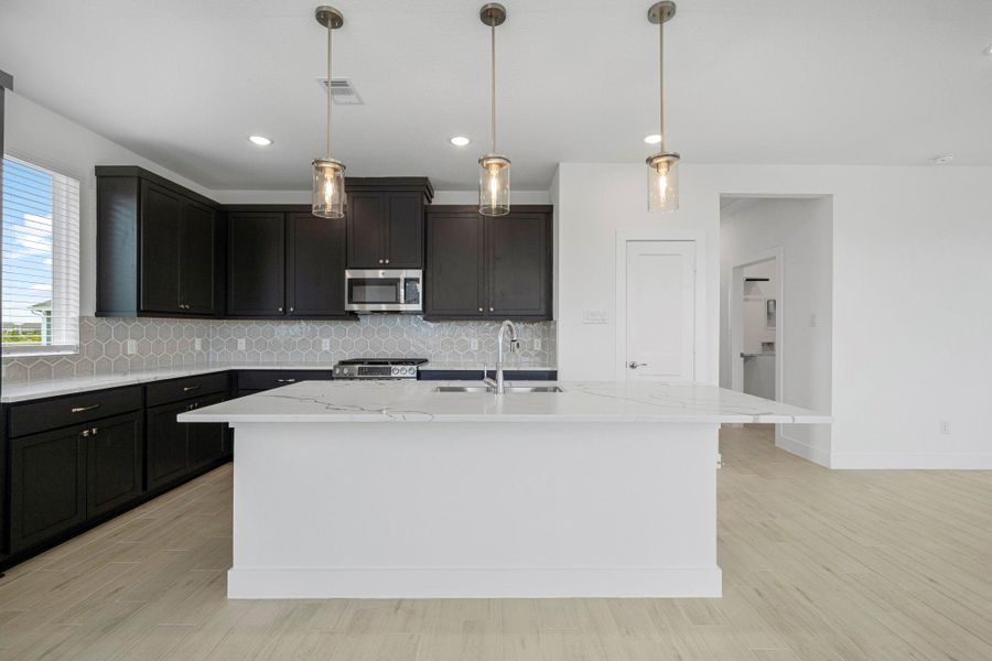 Furnished interior view inside a new home in Bridgeland, Cypress (Image 9). Furnished interior view inside a new home in Bridgeland, Cypress (Image 9).
