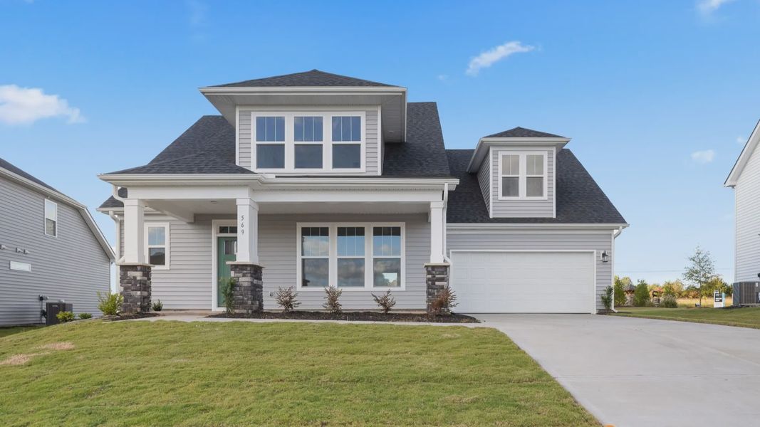 Representative exterior photo of a completed home built from the Sutherland by DRB Homes in Kayfield at Midway, Anderson, SC (Image 25).