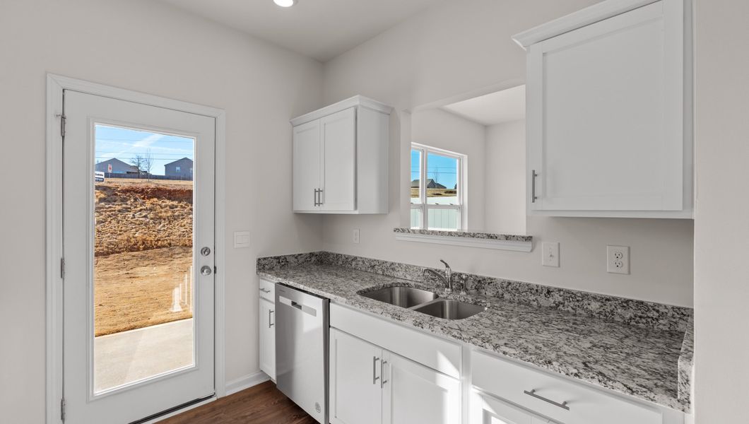Furnished interior view inside a new home in Tanglewood Townes, Greenville (Image 5).