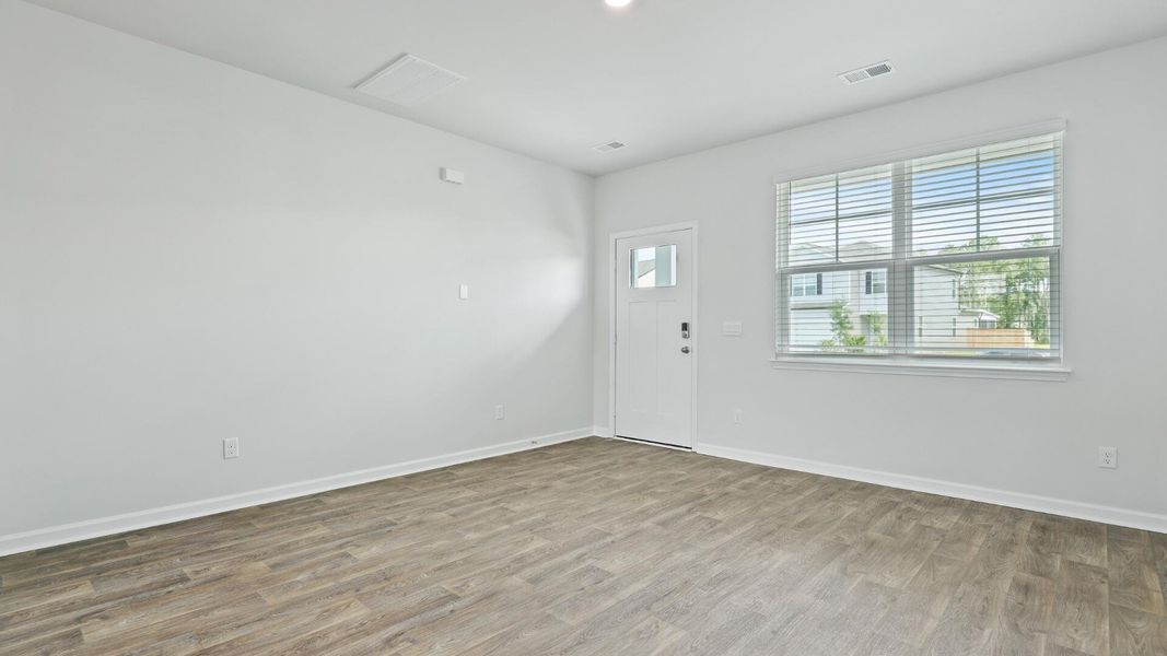 Spacious, unfurnished interior of a new home in Pine Hills at Cane Bay, Summerville (Image 9).