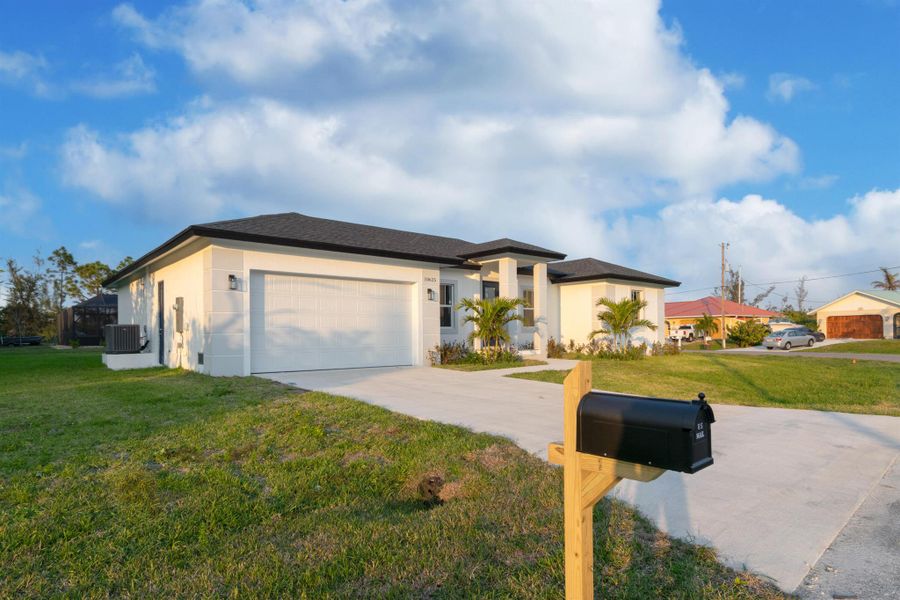 Front exterior of a new home in , Port Charlotte, FL, highlighting curb appeal (Image 1). Front exterior of a new home in , Port Charlotte, FL, highlighting curb appeal (Image 1).