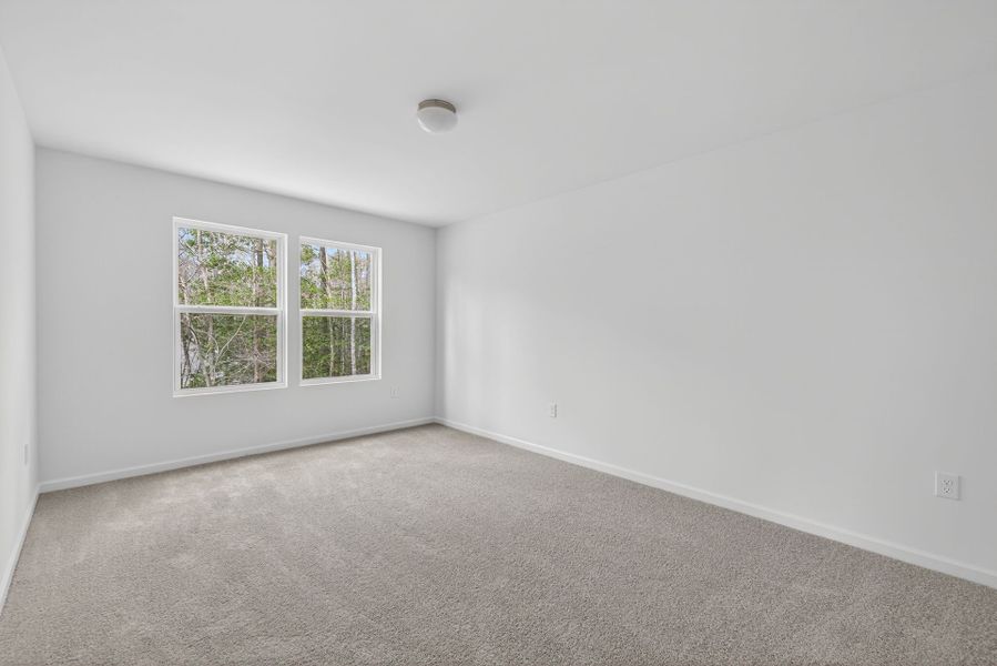 Spacious, unfurnished interior of a new home in Lake Royale, Louisburg (Image 21).
