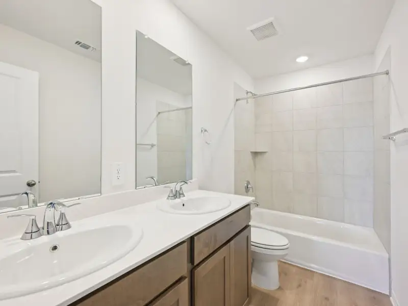 Furnished interior view inside a new home in Lexington Parke, Del Valle (Image 5).
