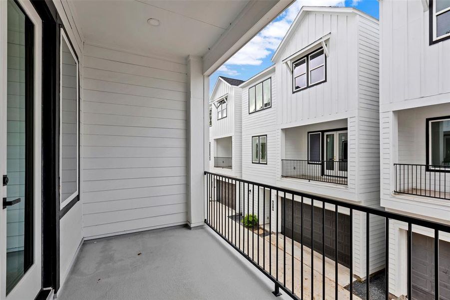 The covered patio space extends your living area. (Model Unit 9424C)