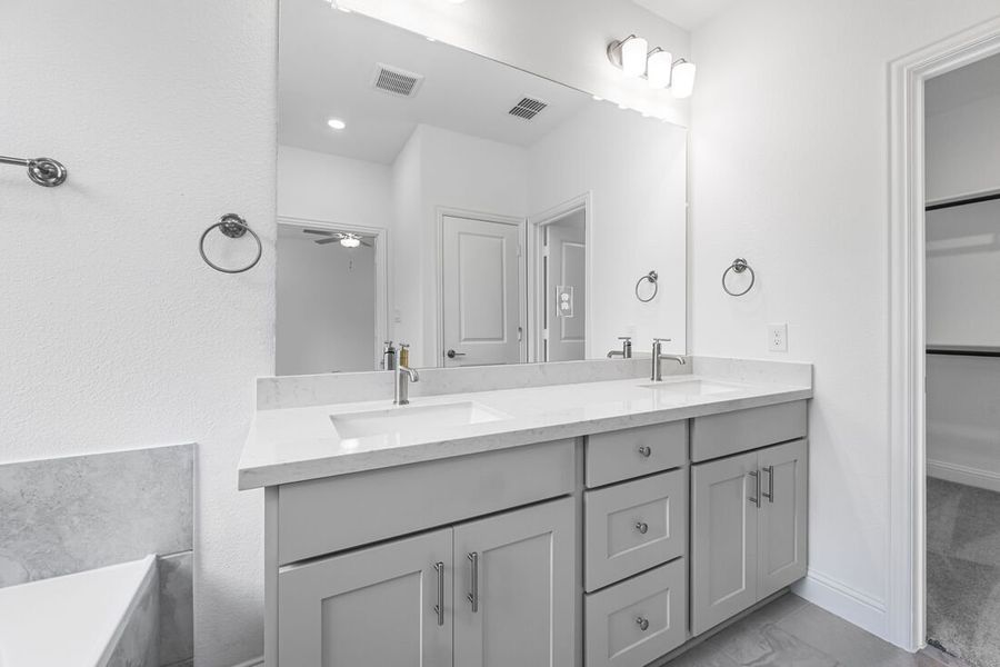 Representative furnished interior of a home built from the Camelia by Taylor Morrison in Stoneridge, Melissa (Image 12).