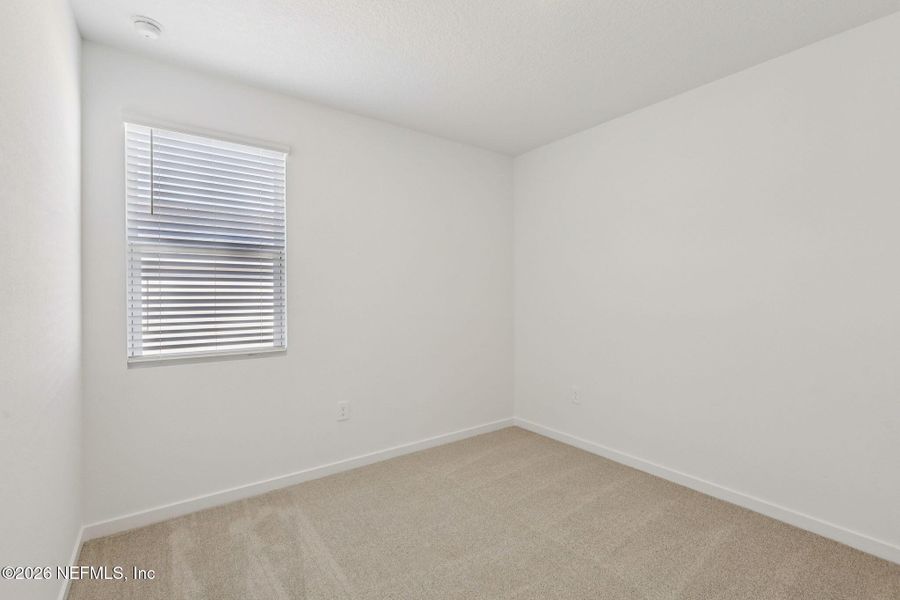 Spacious, unfurnished interior of a new home in Lakes at Bella Lago - Signature Series, Green Cove Springs (Image 15).