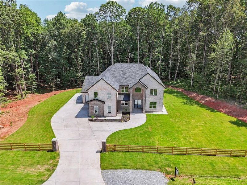 Front exterior of a new home in , Commerce, GA, highlighting curb appeal (Image 30).