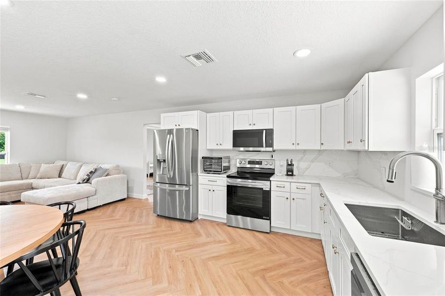 Furnished interior view inside a new home in , Okeechobee (Image 35). Furnished interior view inside a new home in , Okeechobee (Image 35).