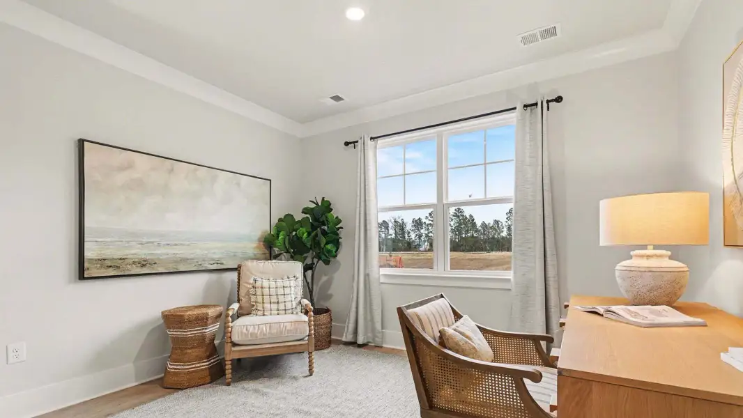 Representative furnished interior of a home built from the Belfort by D.R. Horton in Riverlake, Supply (Image 18).