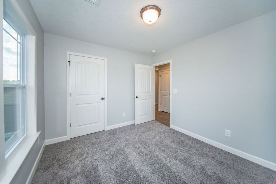 Representative unfurnished interior of a home built from the Heatherwood by Enchanted Homes in Ballentine Ridge, Lyman (Image 21).