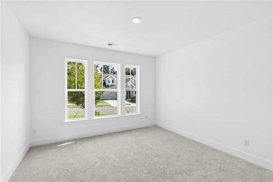 Spacious, unfurnished interior of a new home in Maple Grove at Towne Lake, Woodstock (Image 14).