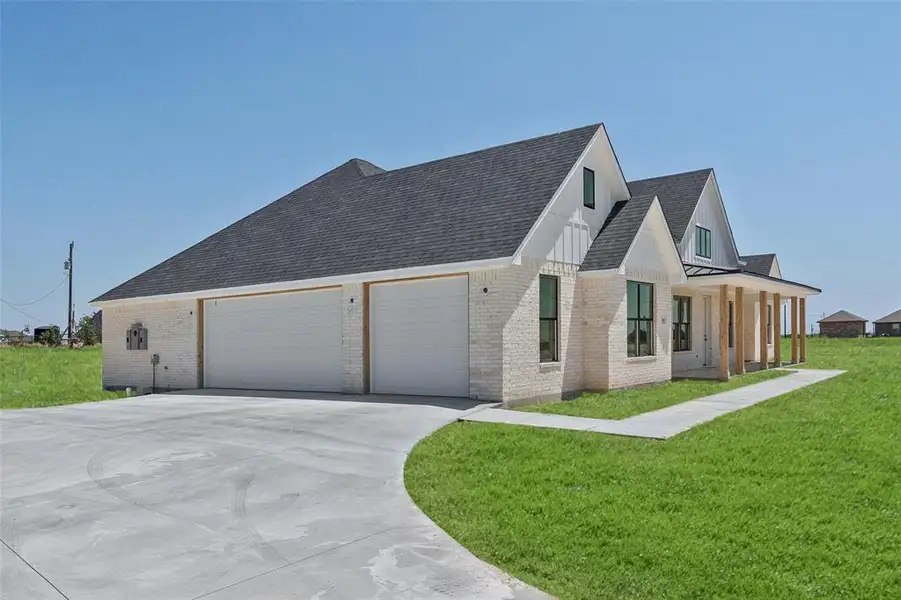 Front exterior of a new home in , Weatherford, TX, highlighting curb appeal (Image 2). Front exterior of a new home in , Weatherford, TX, highlighting curb appeal (Image 2).