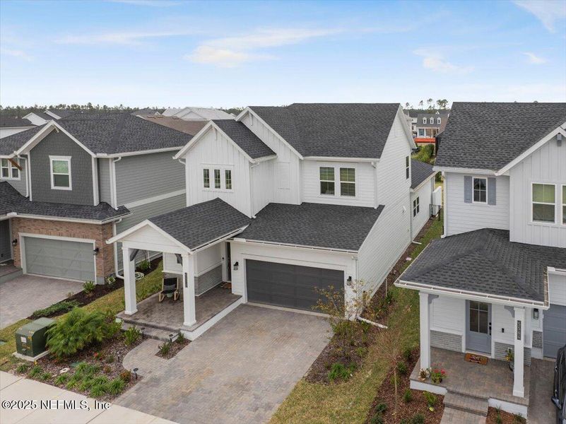 Front exterior of a new home in , Jacksonville, FL, highlighting curb appeal (Image 28).