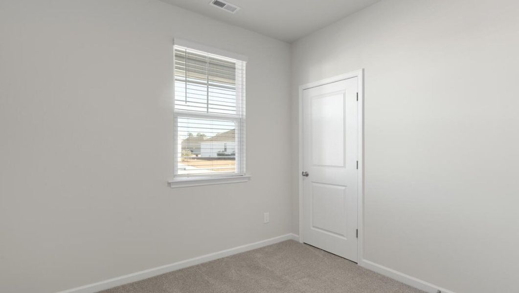Spacious, unfurnished interior of a new home in Cedar Hill Landing, Navassa (Image 22).