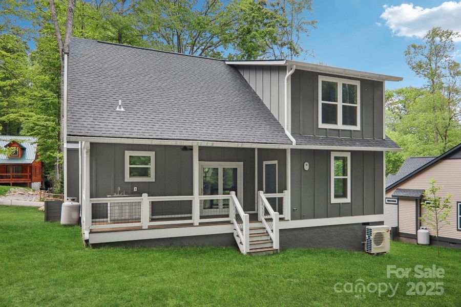 Front exterior of a new home in , Maggie Valley, NC, highlighting curb appeal (Image 1).