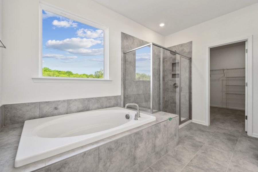 Representative furnished interior of a home built from the Madison Premier by Taylor Morrison in Stafford at Langtree, Mooresville (Image 22).