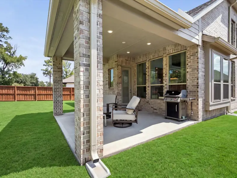 Oversized covered patio. Gas line hookup for future outdoor kitchen