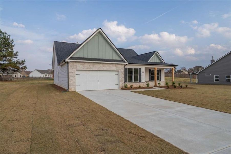 Front exterior of a new home in , Good Hope, GA, highlighting curb appeal (Image 19).