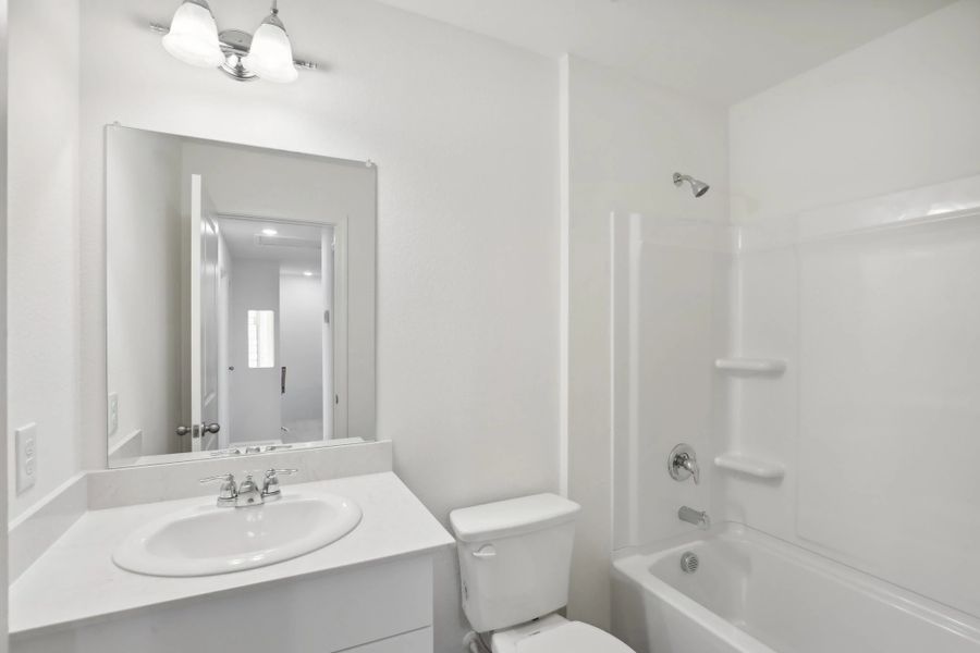 Representative furnished interior of a home built from the Orbit by Starlight Homes in Coyote Meadows, Anna (Image 14).