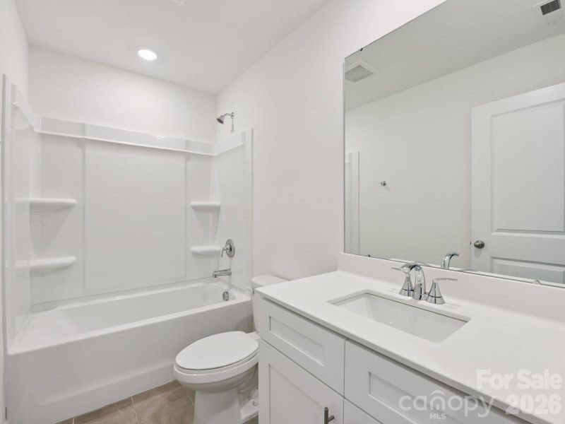 Photo is not of the actual home, but is an inspirational photo of builder’s model home and may depict options, furnishings, and/or decorator features that are not included