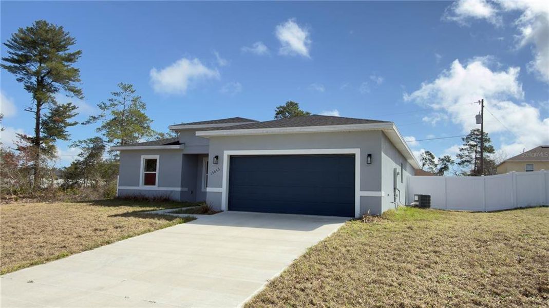 Front exterior of a new home in , Ocala, FL, highlighting curb appeal (Image 2). Front exterior of a new home in , Ocala, FL, highlighting curb appeal (Image 2).