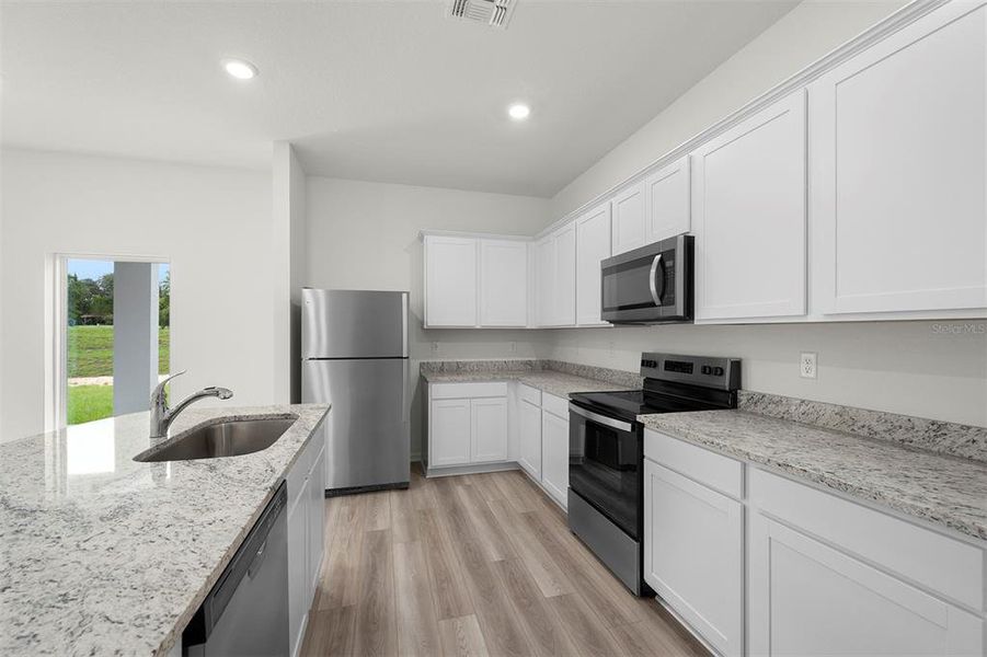 Furnished interior view inside a new home in , Astatula (Image 6).