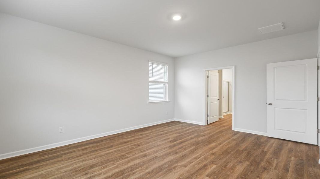 Spacious, unfurnished interior of a new home in The Cove at Mallard Crossing, Summerville (Image 19).
