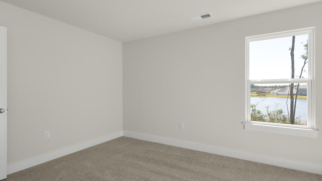 Spacious, unfurnished interior of a new home in Sidbury Station, Castle Hayne (Image 41).