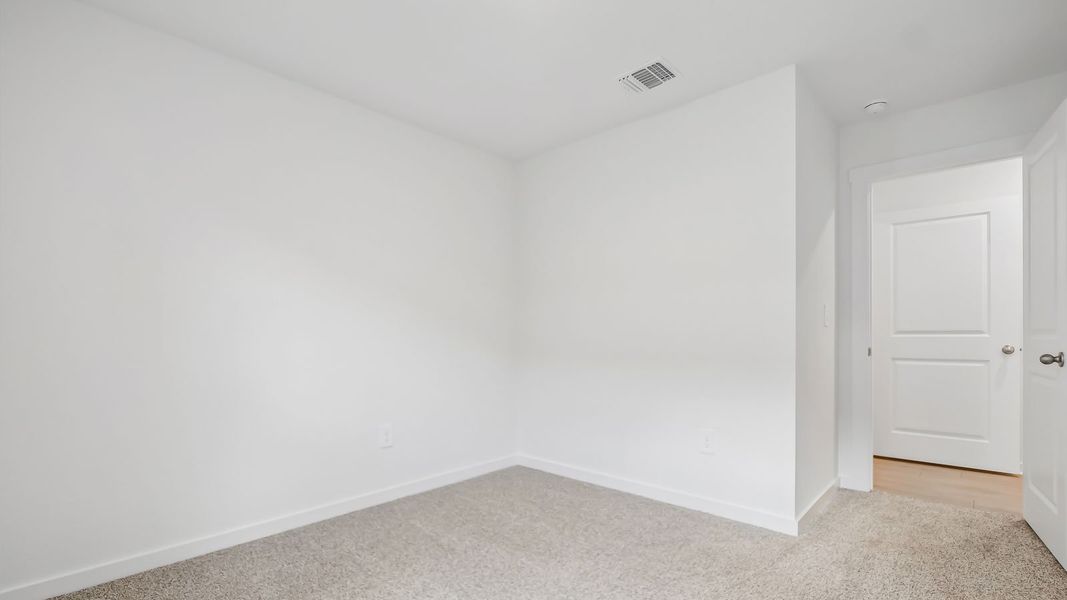 Spacious, unfurnished interior of a new home in Trails at Wildhorse, Austin (Image 30).