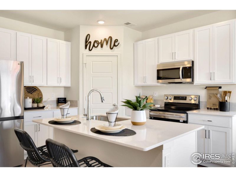 Stock Photos - home is complete! May contain additional upgrades. Come take a look! - Kitchen