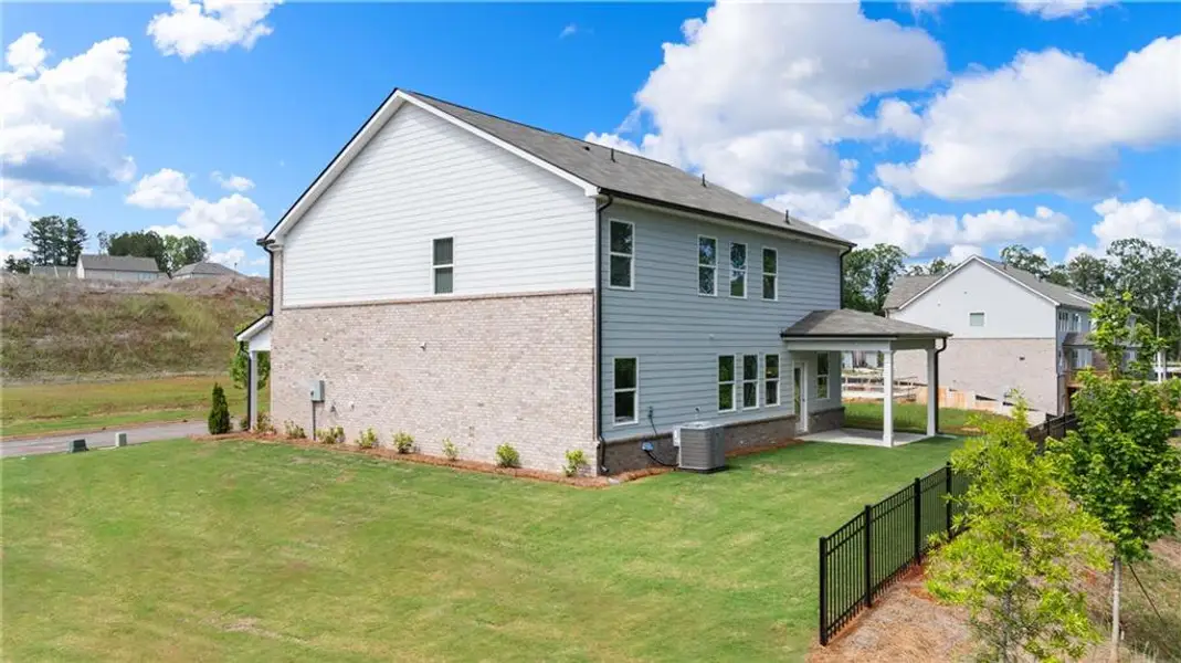 Exterior details and patio area of a home in Alcovy Village, Lawrenceville (Image 43).