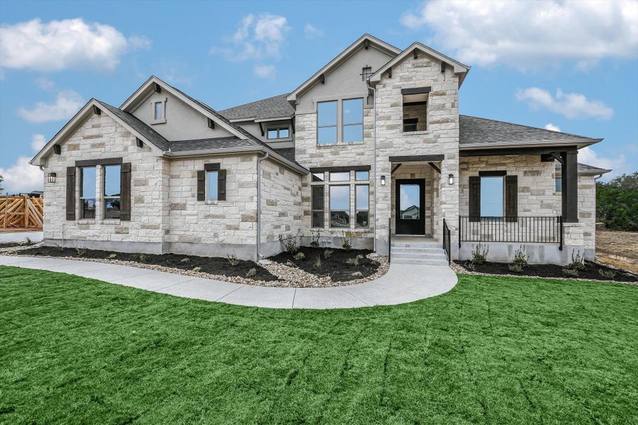 Representative exterior photo of a completed home built from the Madera II by Giddens Homes in Scofield Farms Estates, Georgetown, TX (Image 66).