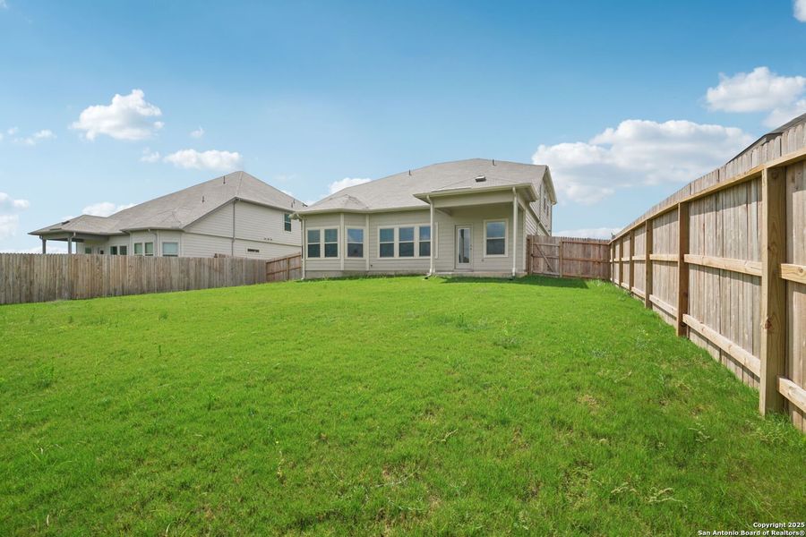 Front exterior of a new home in Legendary Trails - Classic Series, Cibolo, TX, highlighting curb appeal (Image 28). Front exterior of a new home in Legendary Trails - Classic Series, Cibolo, TX, highlighting curb appeal (Image 28).