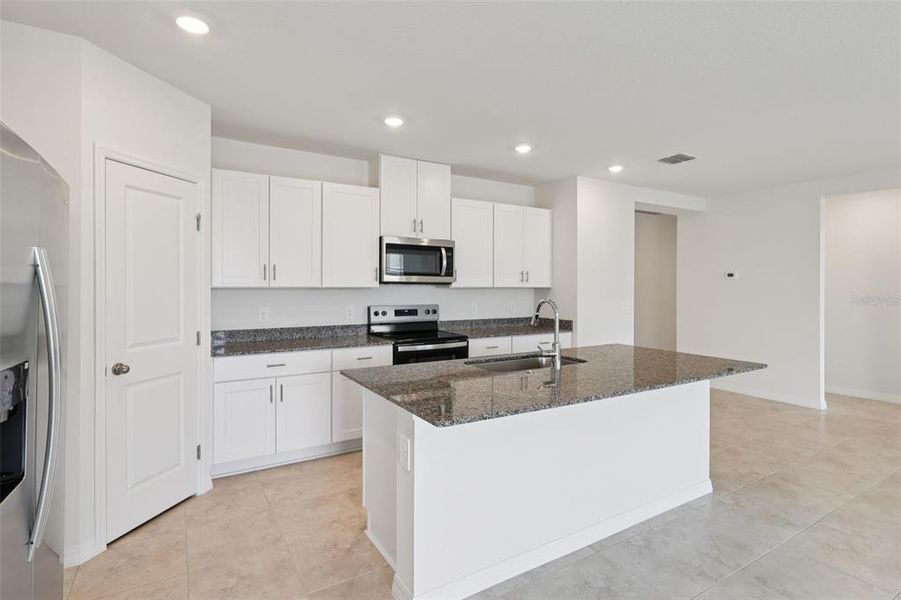 Furnished interior view inside a new home in Crosswinds - Signature Series, Haines City (Image 11).