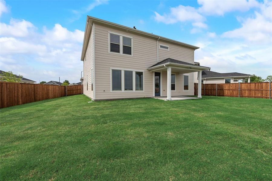 Front exterior of a new home in Creekside of Crowley, Crowley, TX, highlighting curb appeal (Image 19). Front exterior of a new home in Creekside of Crowley, Crowley, TX, highlighting curb appeal (Image 19).