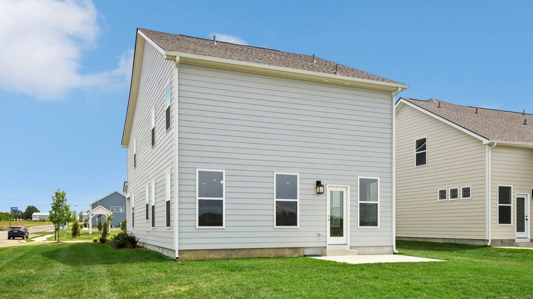 Backyard of home with small back patio Backyard of home with small back patio