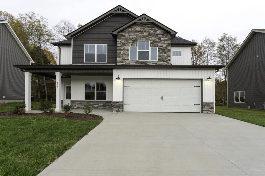 Representative exterior photo of a completed home built from the Winslow by Rockwood Homes in Cherry Fields, Clarksville, TN (Image 16). Representative exterior photo of a completed home built from the Winslow by Rockwood Homes in Cherry Fields, Clarksville, TN (Image 16).