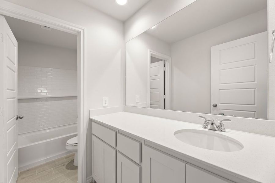 Representative exterior photo of a completed home built from the Maple by Impression Homes in Bryant Farms, Melissa, TX (Image 22). Representative exterior photo of a completed home built from the Maple by Impression Homes in Bryant Farms, Melissa, TX (Image 22).