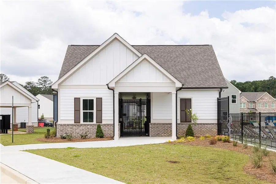 Front exterior of a new home in Riverside Ridge, Lawrenceville, GA, highlighting curb appeal (Image 2).