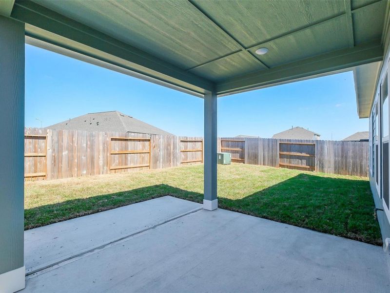 Exterior details and patio area of a home in Sunterra, Katy (Image 4).