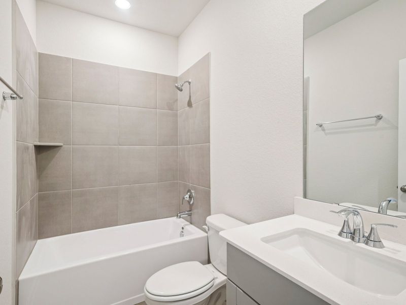 Furnished interior view inside a new home in Riviera Pines - Classic Series, Huffman (Image 7).