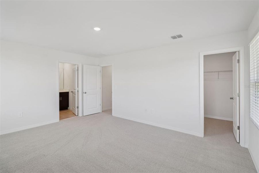 Spacious, unfurnished interior of a new home in The Reserve at Hammock Oaks Townes, Lady Lake (Image 28). Spacious, unfurnished interior of a new home in The Reserve at Hammock Oaks Townes, Lady Lake (Image 28).