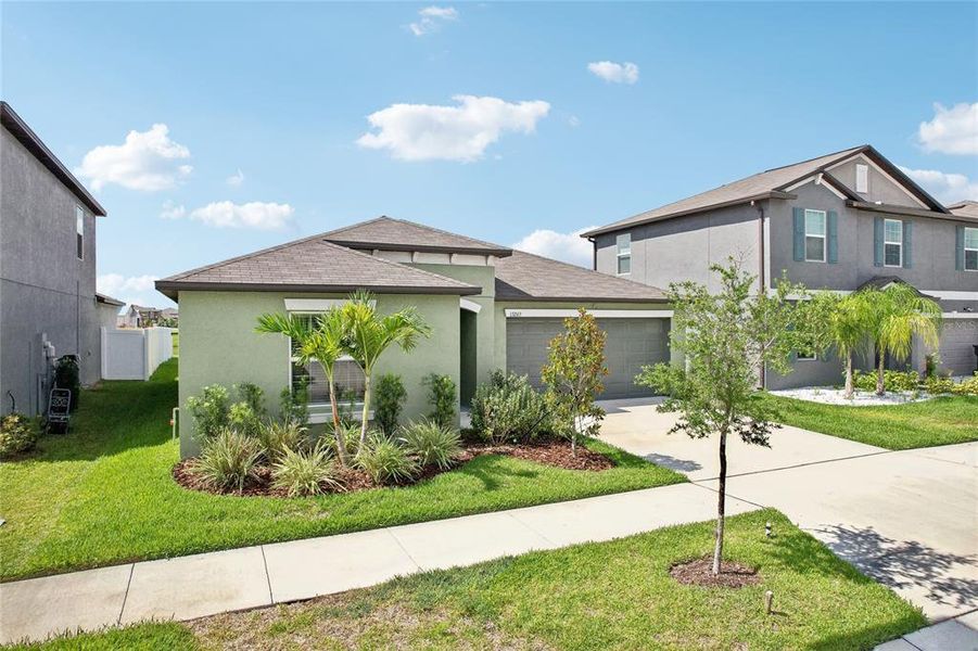 Front exterior of a new home in , Riverview, FL, highlighting curb appeal (Image 22).