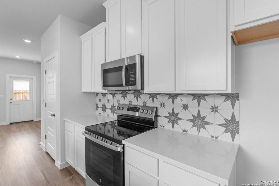 Furnished interior view inside a new home in Highland Ridge, New Braunfels (Image 9). Furnished interior view inside a new home in Highland Ridge, New Braunfels (Image 9).